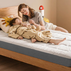 Mother reading to child on ABLYEA Kids Tencel Mattress for cozy bedtime comfort and growing kids